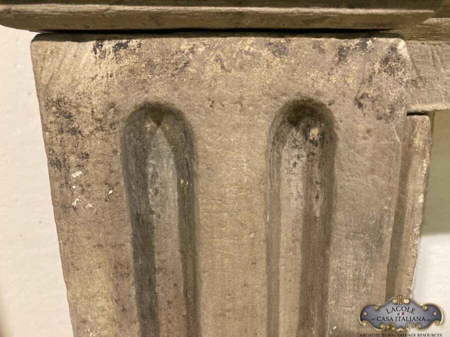 Antique fireplace in stone
