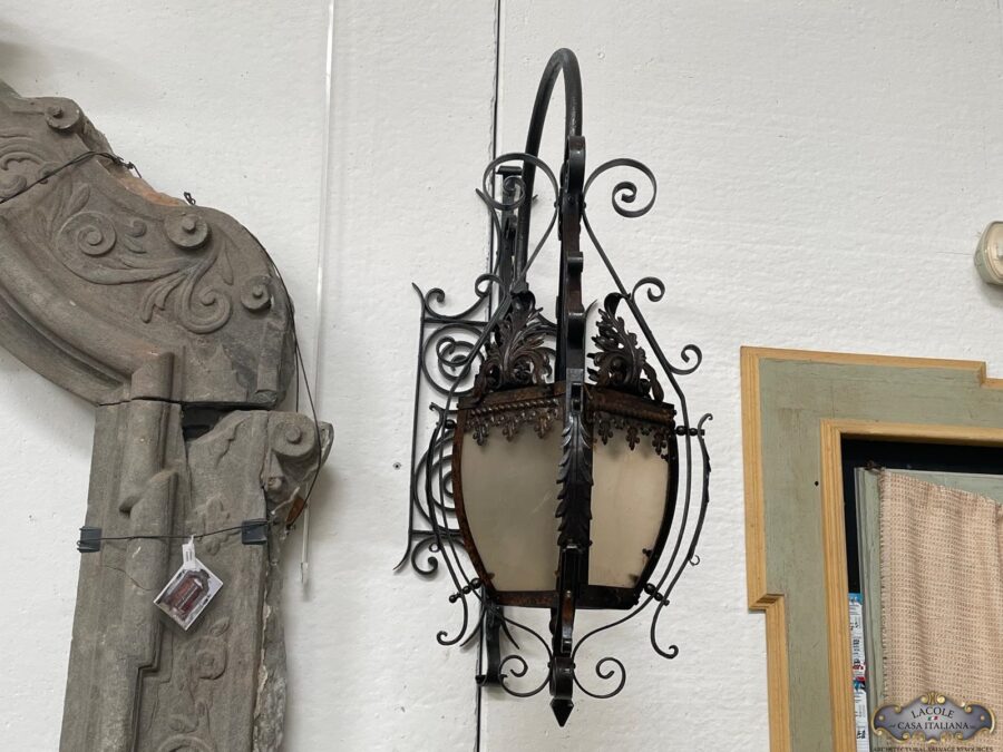 Antique forged iron wall light , it manteince its original glasses , dated back late 18 century , electrified beginning of 19 century .