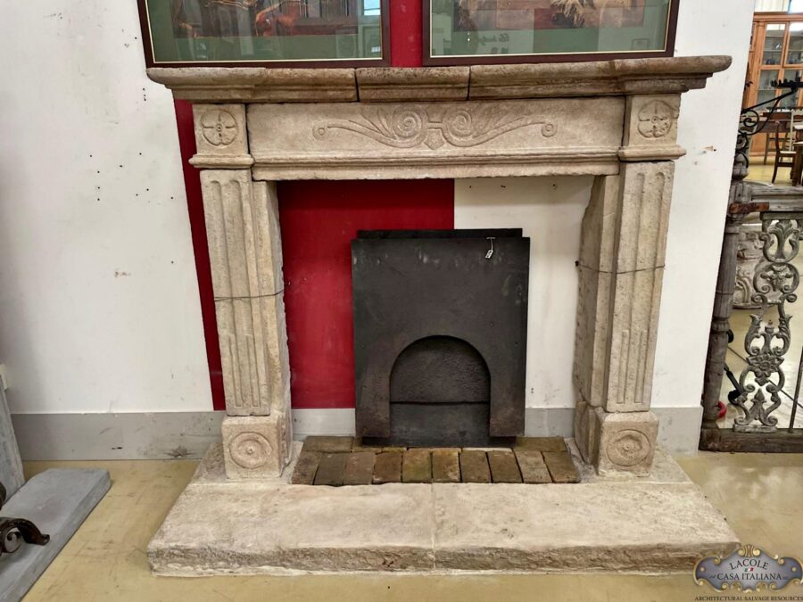 <h3>Antique light stone fireplace</h3>