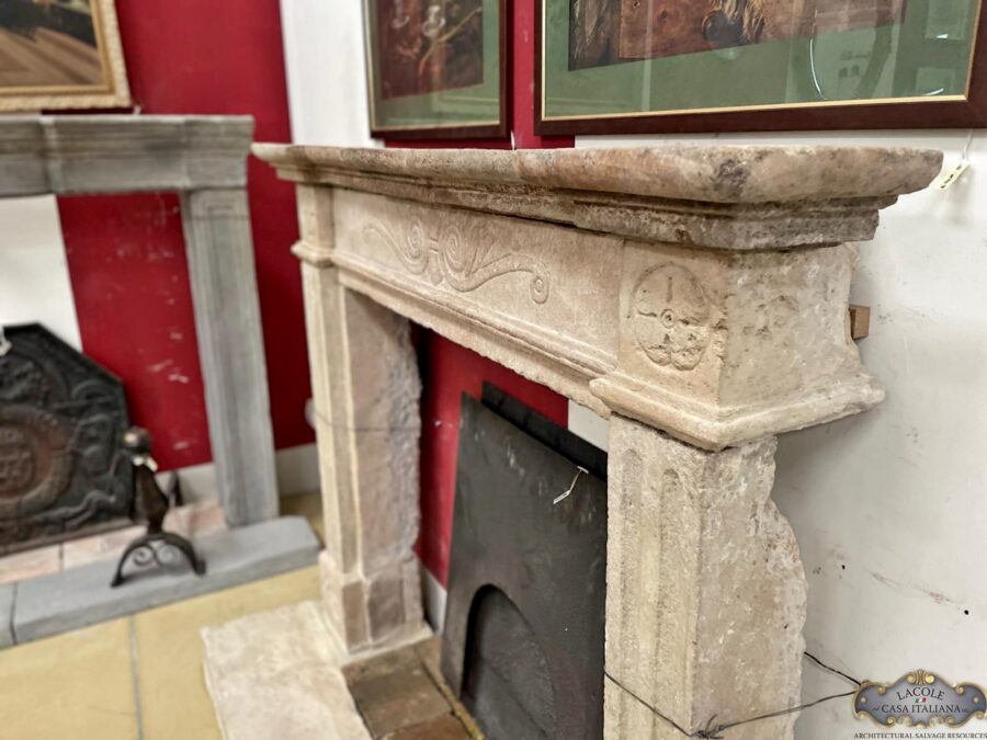 <h3>Antique light stone fireplace</h3>
