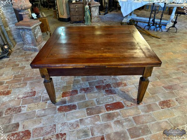 Table with pull-out extensions