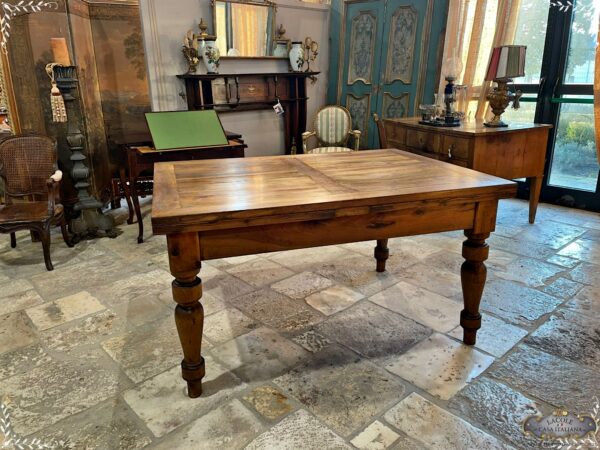 Table with pull-out extensions